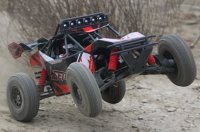 TM560015R Auto - 1/8 Elektrisch - 4WD Desert Truck - RTR - 2200kv Brushless Motor - 3-6S - Wasserdicht - Team Magic SETH Rot/Schwarz / TM560015R